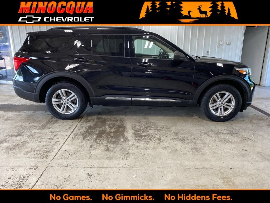2020 Ford Explorer XLT in Black — front three-quarter view
