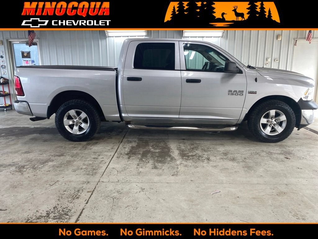 2015 RAM 1500 Tradesman in Silver — front three-quarter view