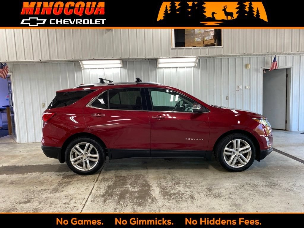 2018 Chevrolet Equinox Premier in Cajun Red Tintcoat — front three-quarter view