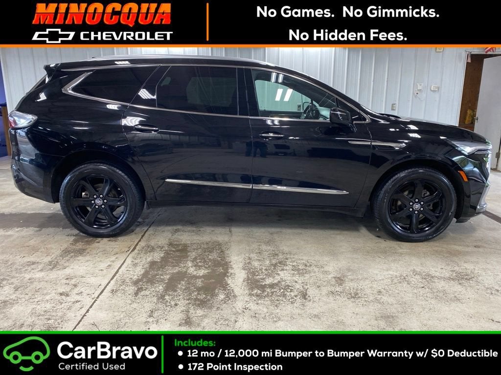2023 Buick Enclave Essence in Ebony Twilight Metallic — front three-quarter view